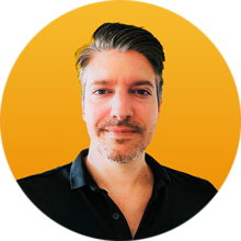 headshot-adam-yellow